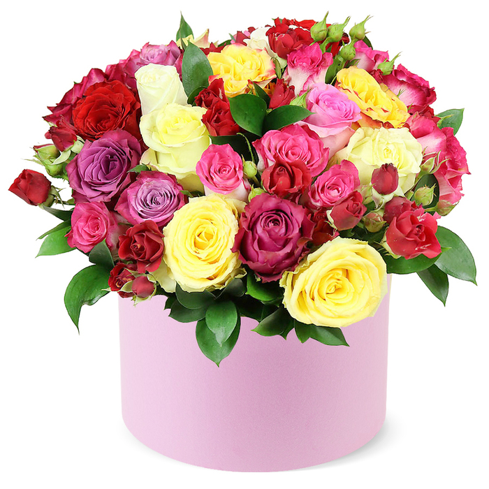 An opulent, domed bouquet of mixed roses rises from a soft pastel pink round hat box, presented against a pristine white backdrop. The arrangement is a painterly tapestry of colors-crimson reds, sunny yellows, fuchsia pinks, delicate pale pinks, magenta, lavender, and creamy whites-carefully arranged so blooms fill the space with luxurious abundance. Some roses stand tall and fully opened, while others appear as tight buds or small sprays, creating layers of texture and depth, with dark green leaves framing the blossoms like a natural passe-partout. The box's smooth matte finish and its gentle pink hue provide a quiet, modern counterpoint to the bouquet's vibrant palette, producing a look of couture sophistication. The composition exudes celebration and prestige, suggesting gifts for anniversaries, milestone birthdays, or formal acknowledgments.In and around Epping, florists craft pieces like this to capture joy and gratitude, with reliable delivery to homes and businesses alike. Whether you're planning a surprise for a loved one or elevating a special occasion with premium florals, this bouquet embodies refined taste, freshness, and lasting impression.