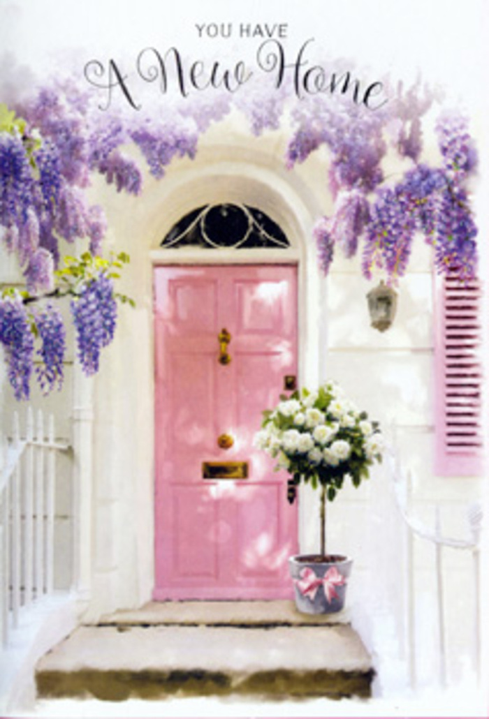 The photograph portrays a peaceful entranceway in Epping that seems to breathe out a soft, welcoming sigh. A pale pink door forms the heart of the composition, its smooth, even paintwork catching a wash of natural light that makes the colour glow with a warm, understated charm. The surrounding walls are white and slightly textured, allowing delicate shadows to dance along their surface. To one side, a pastel shutter echoes the door's gentle blush, tying the scene together with a sense of harmony and balance. Above, mature wisteria cascades down in generous drifts, strands of lavender and lilac blossoms hanging in layered clusters. The flowers crowd around the upper frame of the door, as if nature has framed the entrance in celebration, their imagined scent reminiscent of calm evening walks along Epping's tree-lined lanes. Nestled on the step at the threshold, a simple grey tin bucket becomes an elegant centrepiece thanks to the thoughtful floral design it holds. White and creamy roses fill the container, their blooms at different stages of opening, from tight buds to fully unfurled rosettes. The petals look velvety and full, curving gently outward to create a soft, cloud-like effect. Interlaced among them, sprigs of green foliage introduce depth and a subtle woodland freshness. Around the bucket, a soft pink satin ribbon has been tied, its bow carefully arranged so the ends gently brush the side of the tin. This scene feels like a visual housewarming card, capturing the feeling of unlocking the door to a new Epping home for the first time. It suggests warmth, optimism, and the quiet thrill of stepping into a space that will hold future milestones, all gently expressed through pastel tones and fragrant blooms.